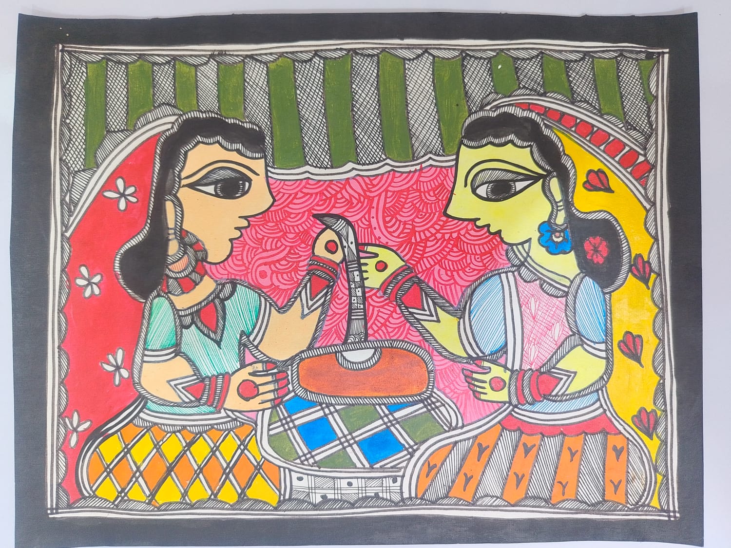 Two women in traditional attire preparing or serving food